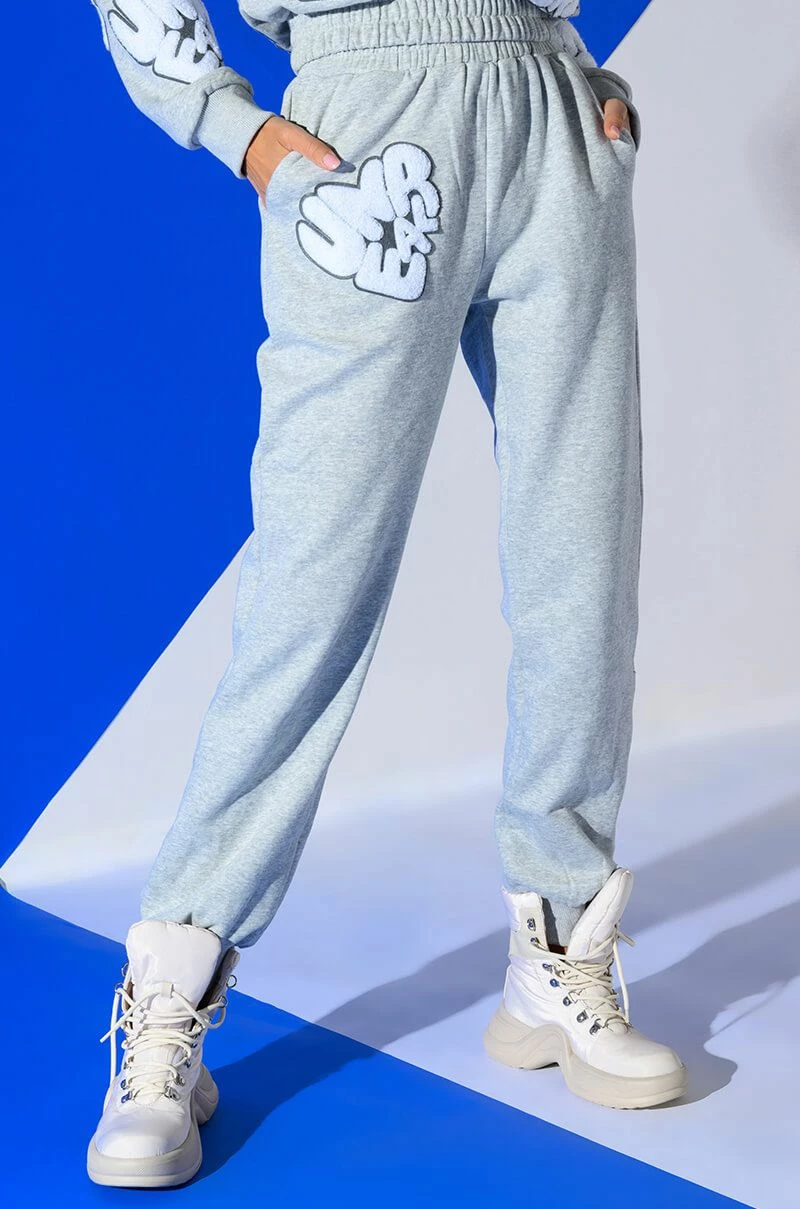 UNREAL JOGGER WITH PATCHES 1 UNREAL JOGGER WITH PATCHES